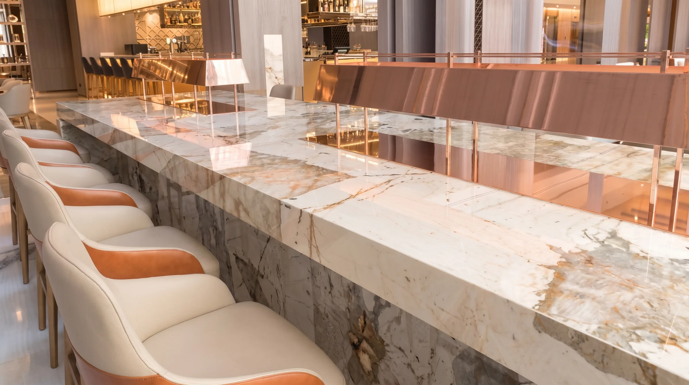 A long Eclipse quartz bar counter in a restaurant